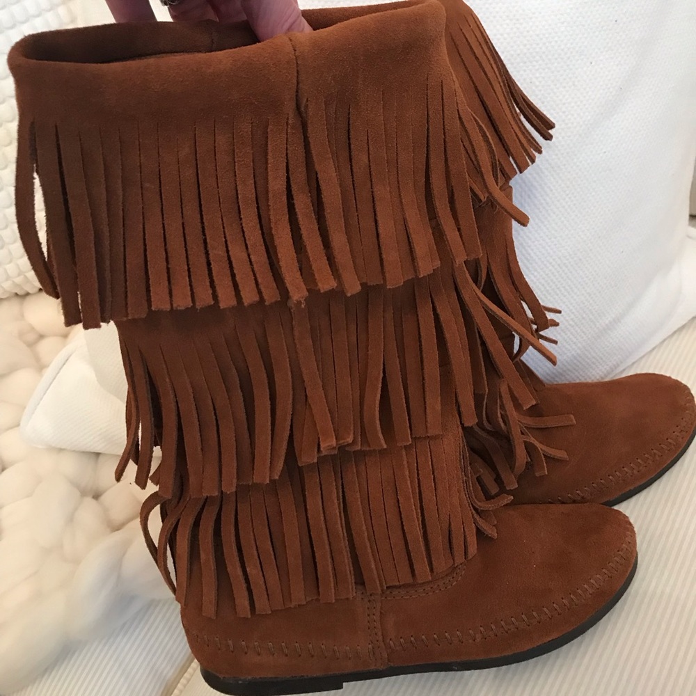 Brand New Minnetonka boots without box. Size 7.